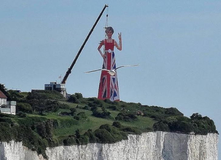 A massive structure of Teresa May flipping off mainland Europe has been erected on the Cliffs of Dover
