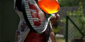 Hitting jello with a tennis racket