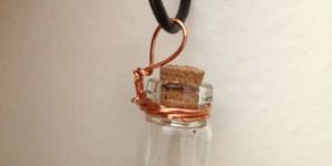 A tiny necklace terrarium