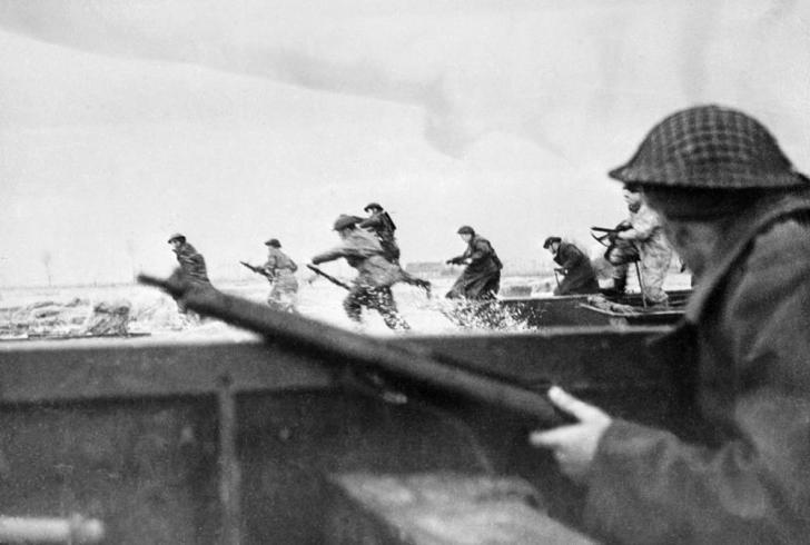 Canadian Soldiers storming the beaches of Normandy along side the USA