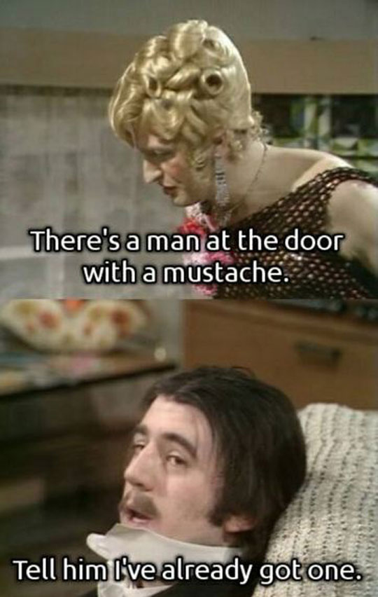There's a man at the door with a mustache.