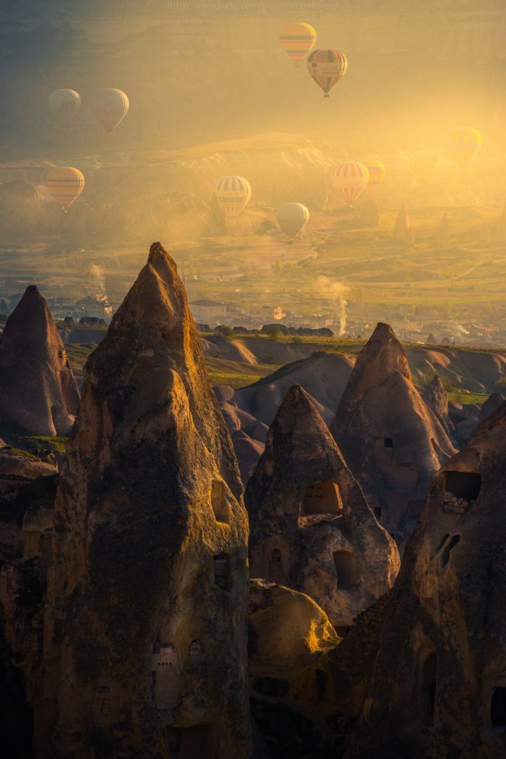 Hot air balloons rise up above Pigeon Valley in Turkey