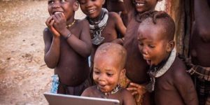 Tribal children see a iPad for the first time
