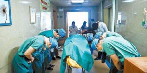 Chinese doctors bowing down to a 11 year old boy diagnosed with brain cancer who managed to save several lives by donating his organs to the hospital he was being treated in shortly before his death.