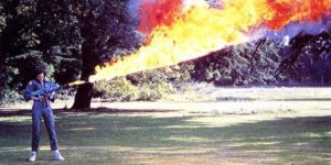 Sigorney Weaver testing the flamethrower for Alien on the lawn at Shepperton Studios