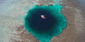 Sansha Yongle Blue Hole is the deepest known salt water blue hole in the world and is located by a major coral reef in the Xisha Islands (Paracel Islands) in the South China Sea