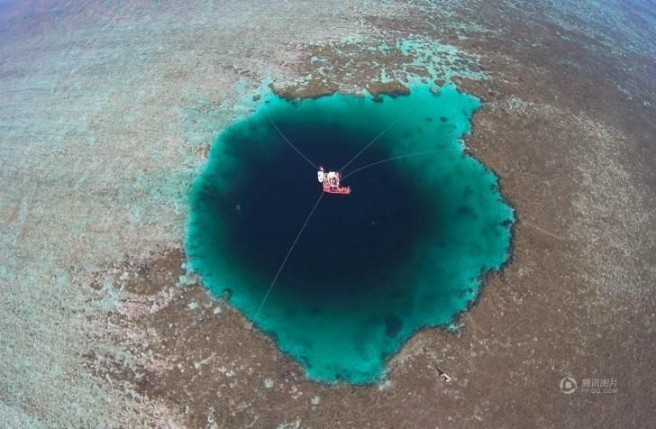 Sansha Yongle Blue Hole is the deepest known salt water blue hole in the world and is located by a major coral reef in the Xisha Islands (Paracel Islands) in the South China Sea