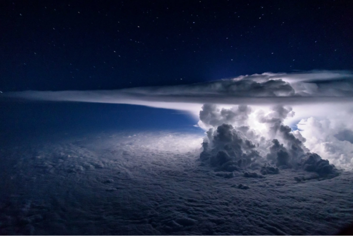 This picture of a thunderstorm at night over the Pacific ocean was taken at 37,000 feet by Santiago Borja