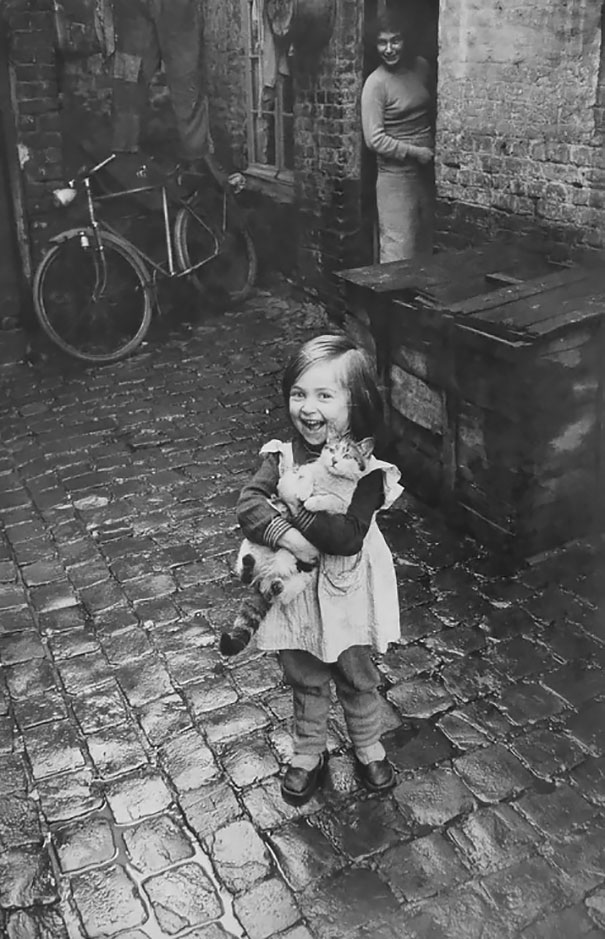 A girl and her cat, England, WWII., circish 1940