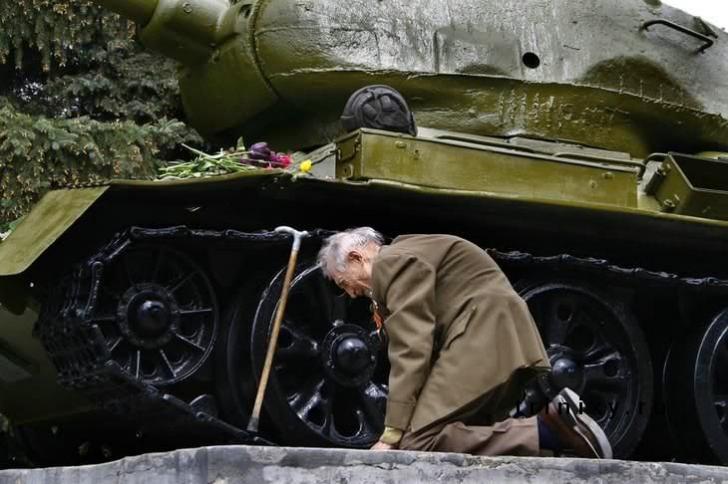 70 years later, WWII Russian Veteran found this old tank standing as a monument in a small Russian town. It is the same tank he and his comrades rode into combat.