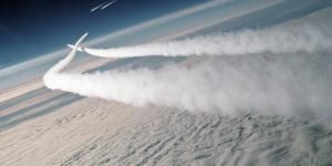 F-15 Eagles scramble to intercept a pair of MiG-29s over the Bering sea – c.1989