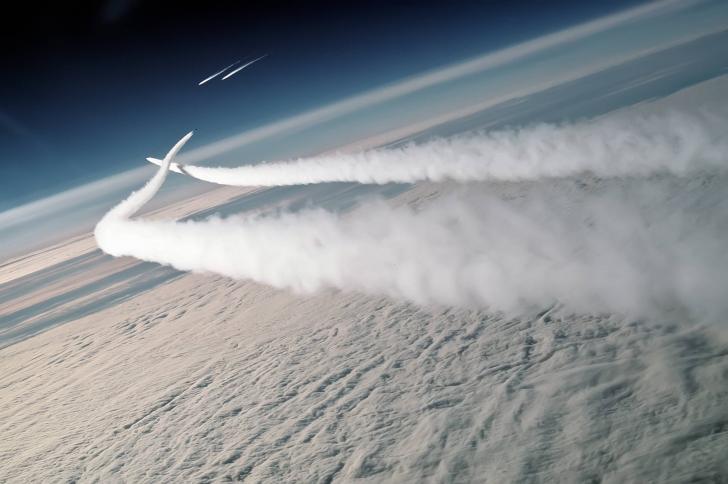 F-15 Eagles scramble to intercept a pair of MiG-29s over the Bering sea - c.1989