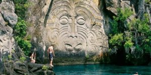 Maori rock carvings at Mine Bay, New Zealand