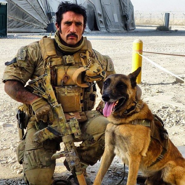 British SAS soldier with his dog in Afghanistan