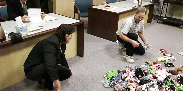 A divorcing couple in 1999 splitting up their Beanie Babies on the floor of the courtroom