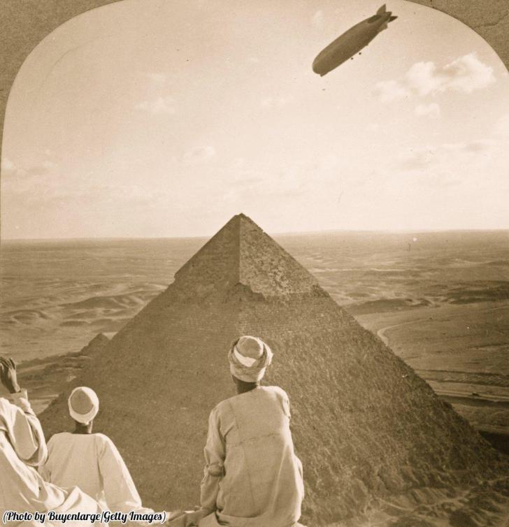 A Zeppelin flying above the Pyramids of Giza in Egypt, 1931