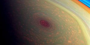 The hurricane at Saturn’s north pole, with rings in the background