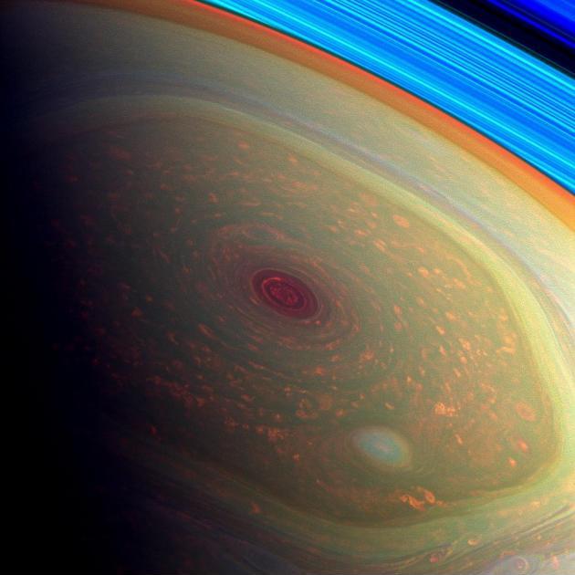 The hurricane at Saturn’s north pole, with rings in the background