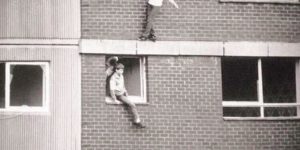 Kids jumping at a pile of mattresses, circa 1977.