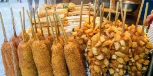 Best Korea puts crinkle cut fries in the corn dog batter…