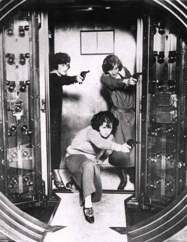 The employees at Cleveland Trust Bank Co. being trained to defend the bank vault, circa 1924. 