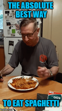 Eating spaghet like a mad man.