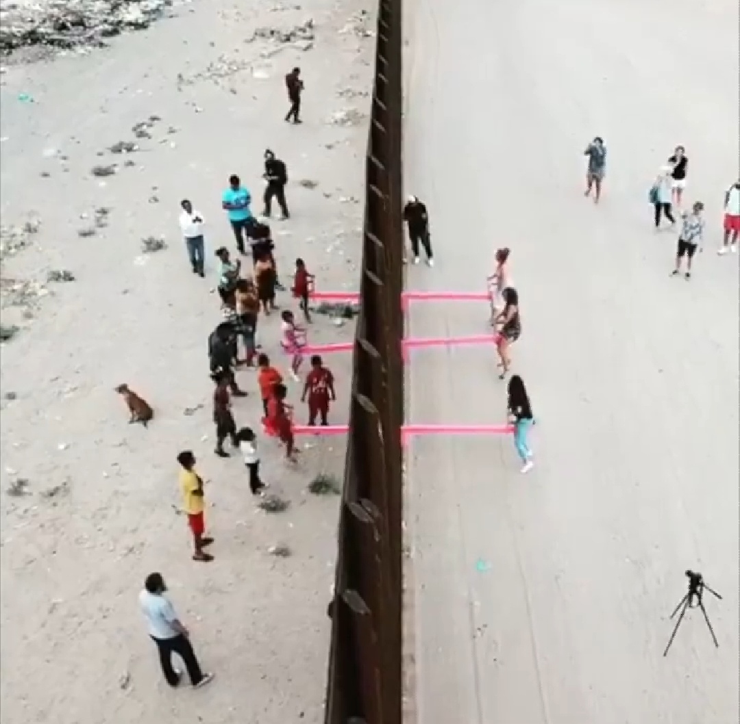 A gaggle of artists installed a see saw at the border wall so that US and Mexican kids can play together