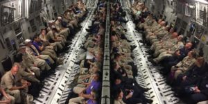 Doctors, nurses, and paramedics on a C-17  heading to Orlando