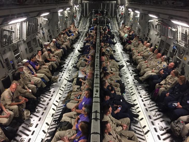 Doctors, nurses, and paramedics on a C-17  heading to Orlando
