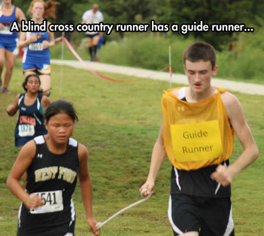 Blind cross country runner with guide