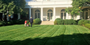 President Trump walking with a boy who asked if he could mow the White House lawn