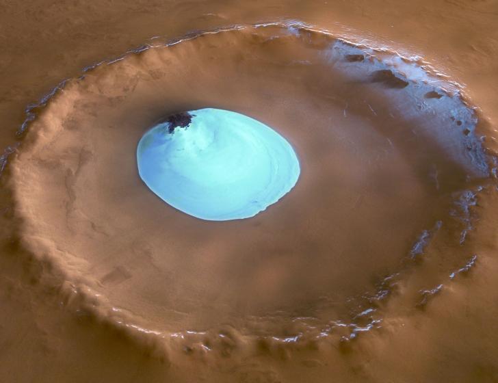 Image of water ice sitting in a Martian crater