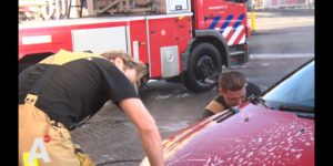 Dutch firefighters washing cars with profits going to help Australian firey bros.