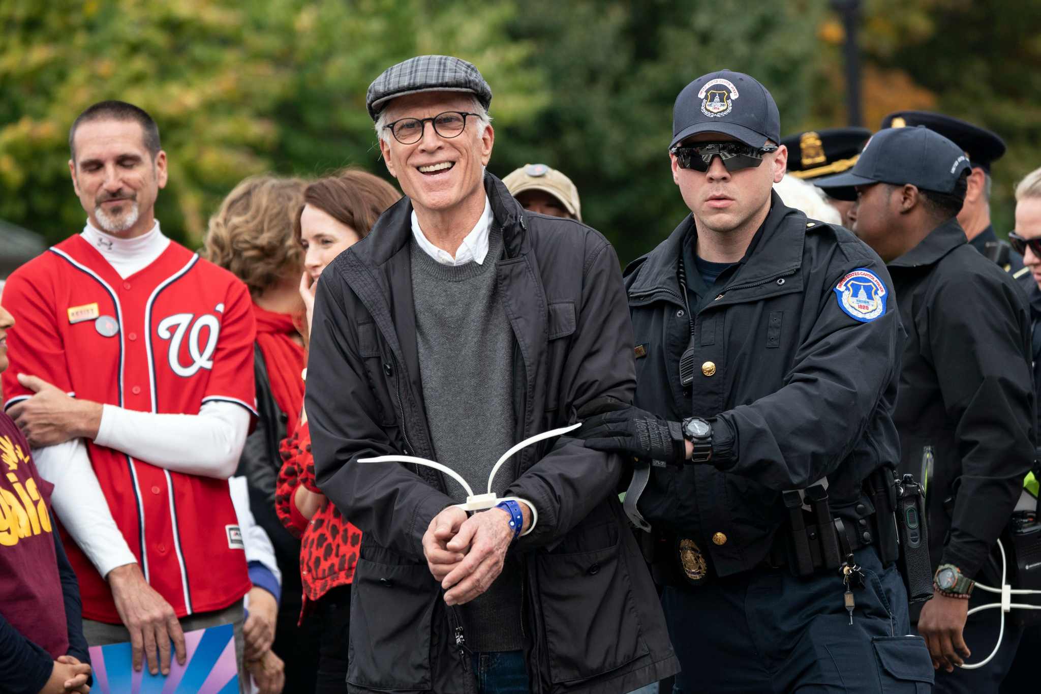 Ted Danson was arrested for protesting climate change in front of Capitol Hill. He seems content...