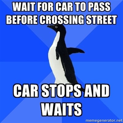 Waiting for car to pass before crossing street...