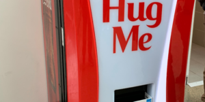 A vending machine that gives you a free coke in exchange for a hug.