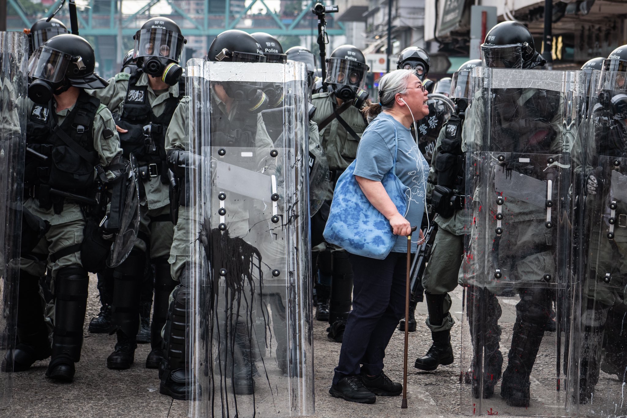 She cried and asked riot police not to fire bullets towards young protesters. -  Hong Kong