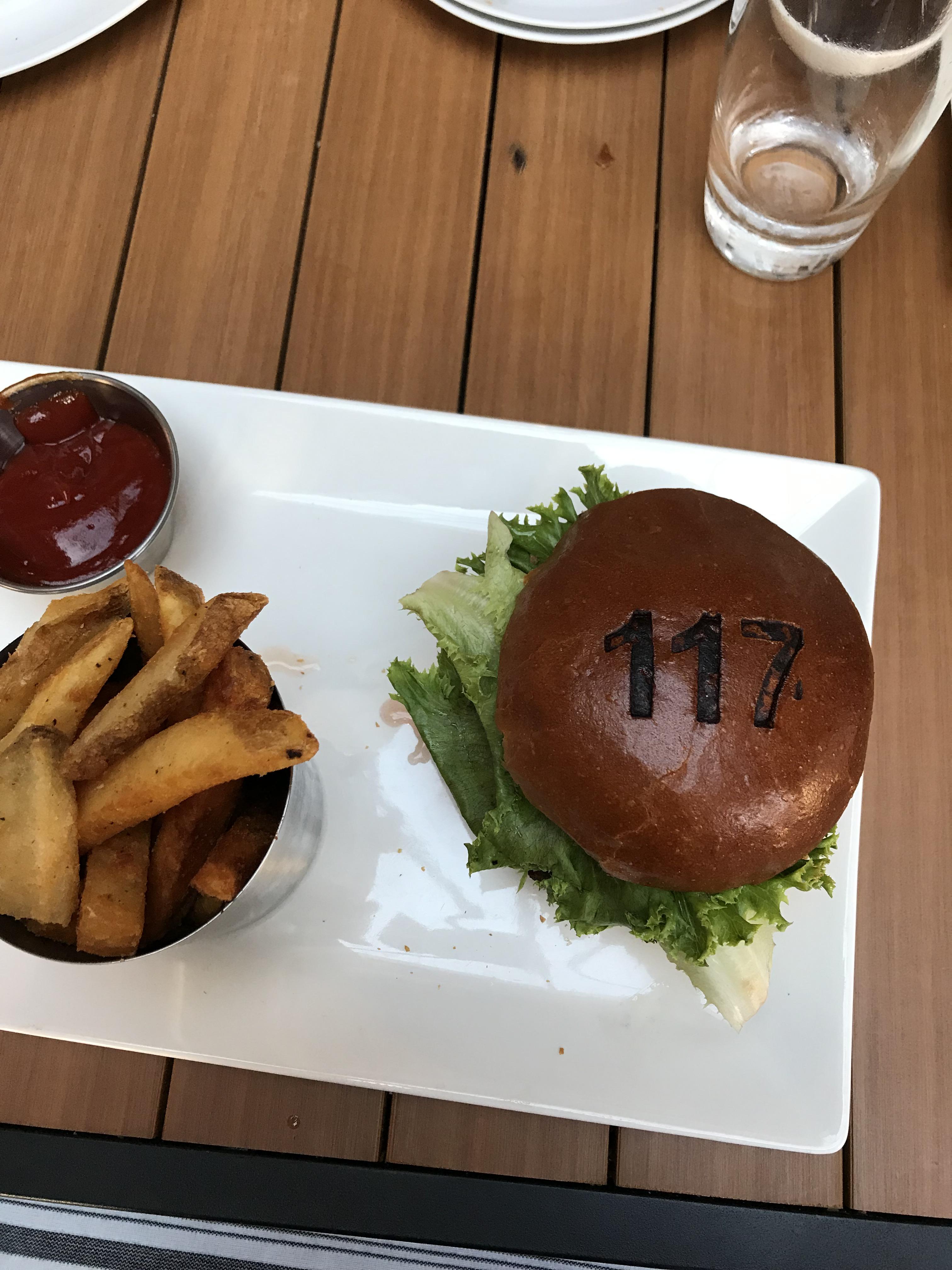Burger for table 117...