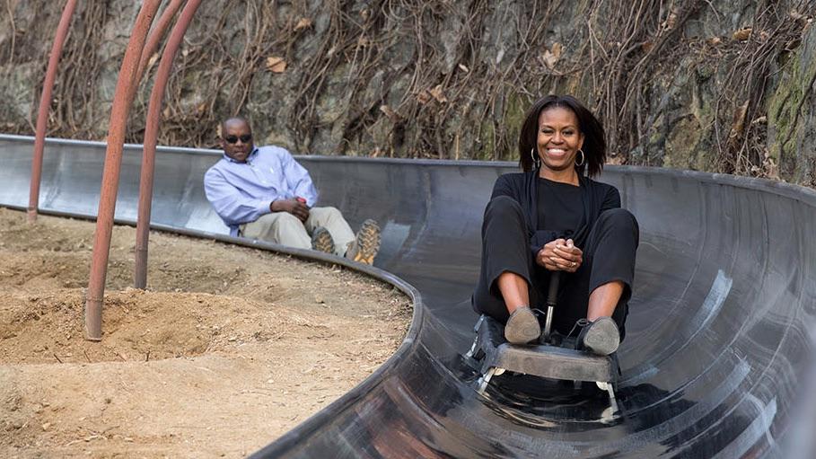 Michelle Obama being stalked by a Secret Service agent.