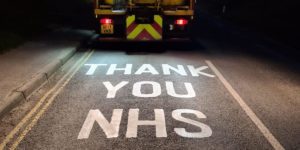 Highway team painting a special message on roads throughout the county of Shropshire, UK