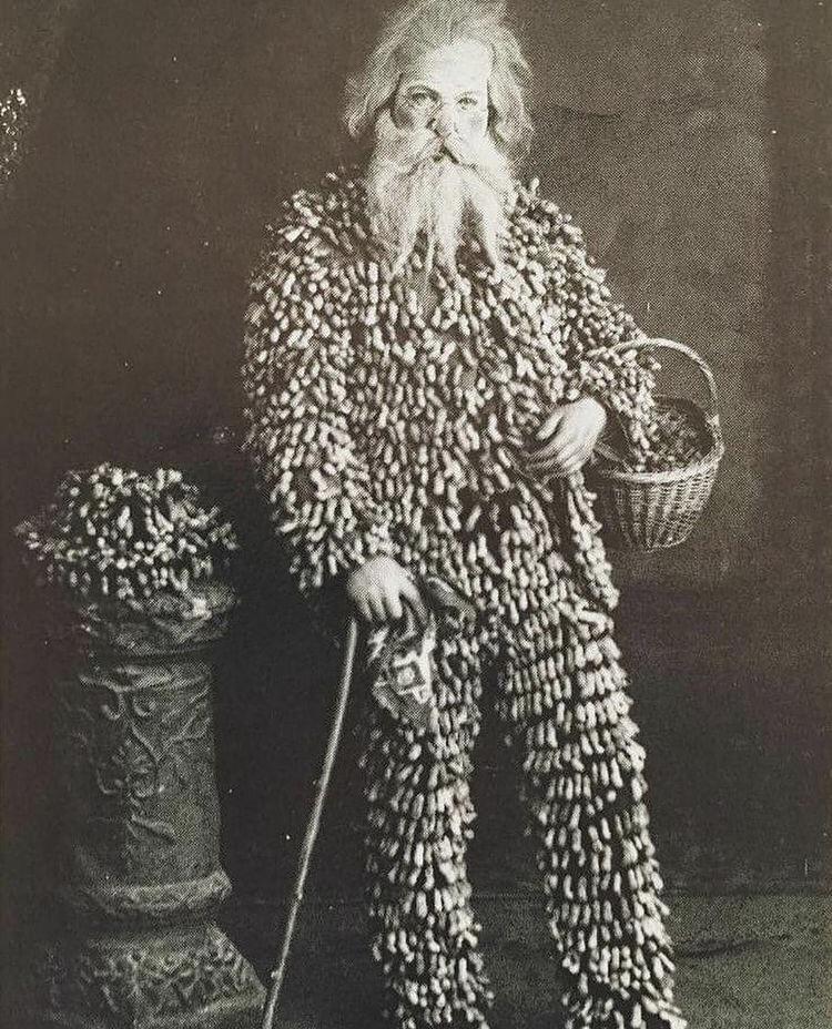 Beware the peanut vendor wearing his suit of peanuts, circa 1895.