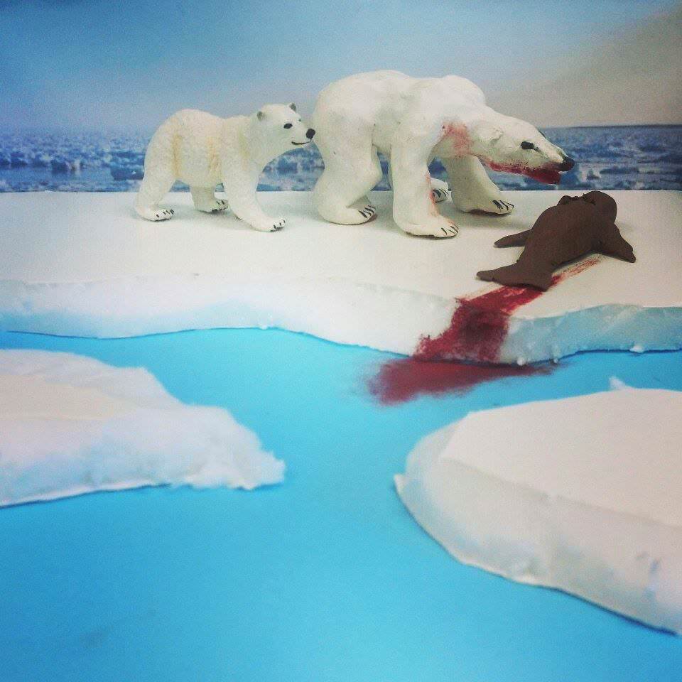 Clay diorama on Polar Bears. She's 9.