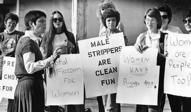 Women rally for male dancers circa 1980