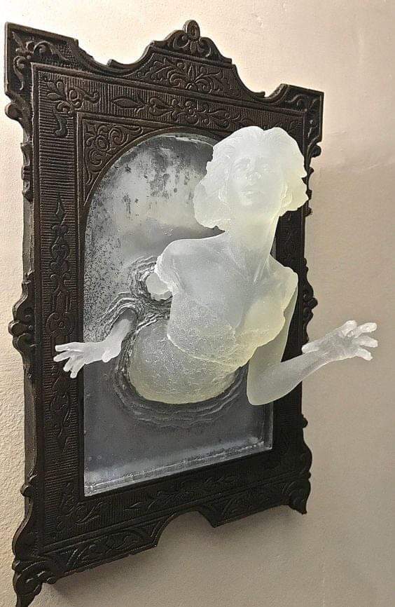 A Victorian ghost emerging from an antique mirror in the halls of Hogwarts.