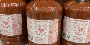Apparently you can buy sriracha buy the pound.