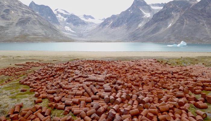 Record low water levels reveal waste dumped by the US in Greenland during the cold war.