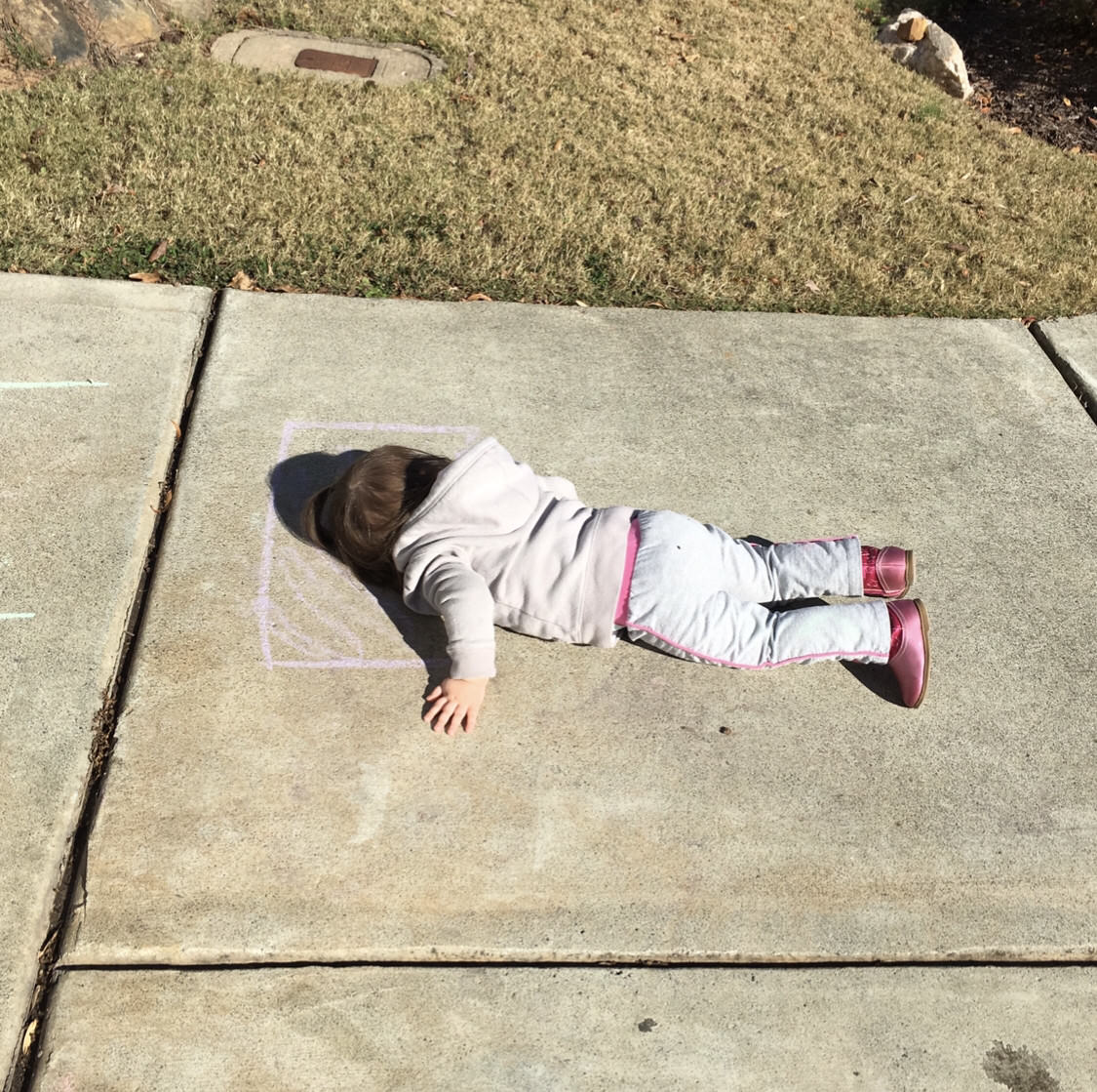 2-yr-old daughter drew a pillow with chalk, then laid down for a nap... Imagination Level 439932.