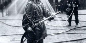 Testing helmets for firefighters, circa Germany 1900.