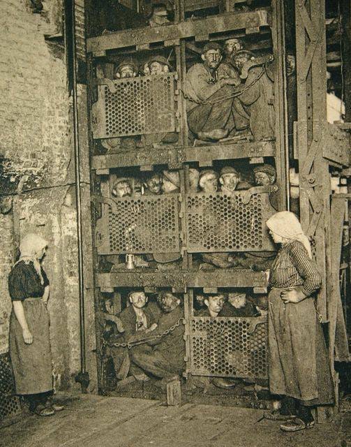Coal Miners coming up for air, 1922, circa Belgium.