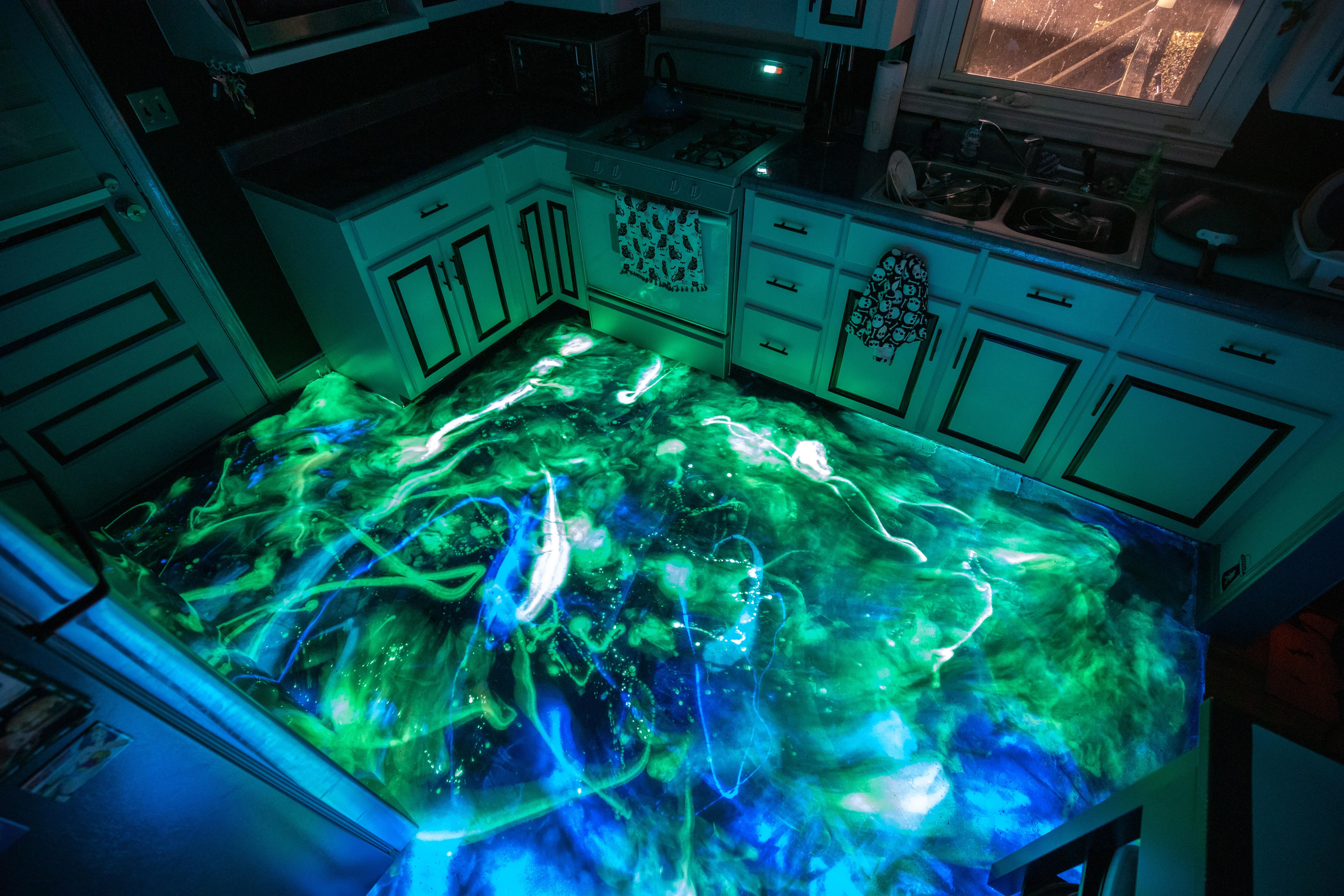 Glow-in-the-dark resin kitchen floor is neat.